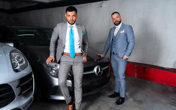 Men in a garage having sex