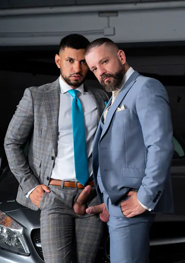 Men in a garage having sex