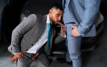 Men in a garage having sex