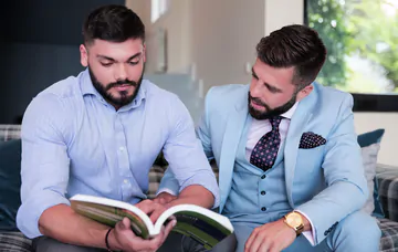 Visually similar men having sex