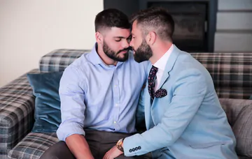 Visually similar men having sex