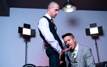 Well dressed men having sex