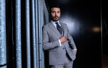 Men in suits having a threesome