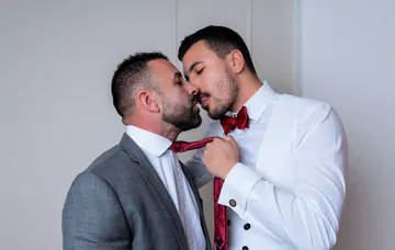 Guys in a hotel room having sex