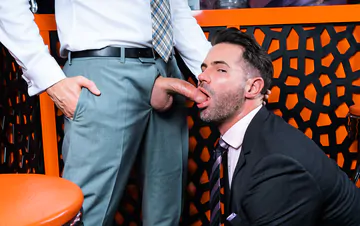 Men in a bar having sex