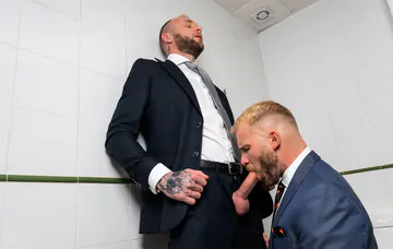 Business men fucking in the bathroom