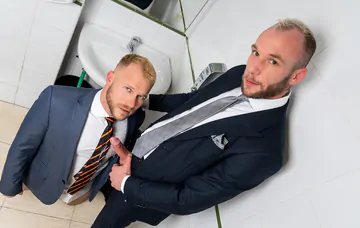 Business men fucking in the bathroom