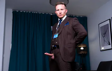 Guys in brown suits having sex