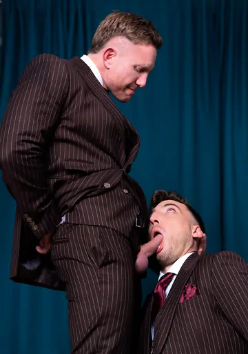 Guys in brown suits having sex