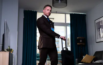 Guys in brown suits having sex