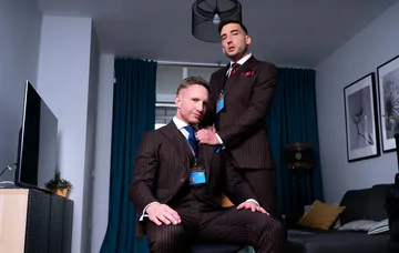 Guys in brown suits having sex