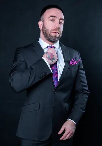 Men in suits having wild sex