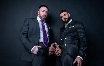 Men in suits having wild sex