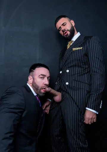 Men in suits having wild sex