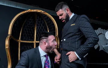 Men in suits having wild sex