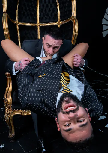 Men in suits having wild sex