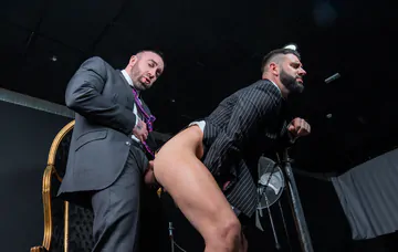 Men in suits having wild sex