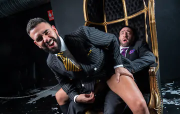 Men in suits having wild sex