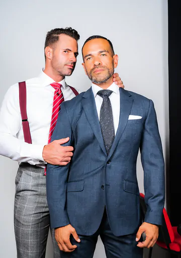 Men in suits having gay sex