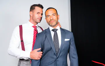 Men in suits having gay sex