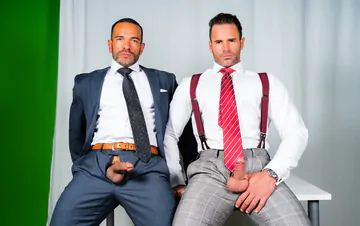 Men in suits having gay sex