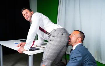 Men in suits having gay sex