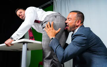 Men in suits having gay sex