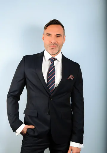 Three guys in suits having sex