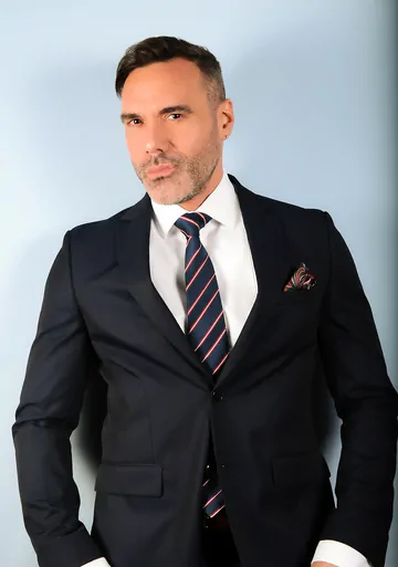 Three guys in suits having sex