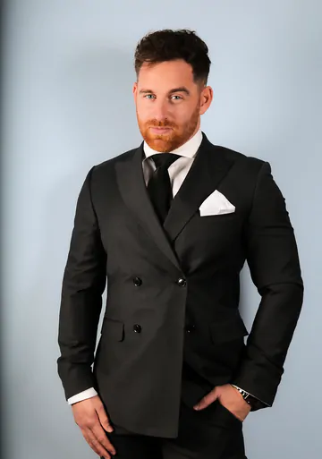 Three guys in suits having sex