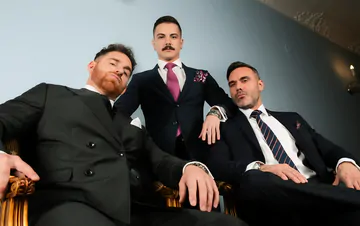 Three guys in suits having sex