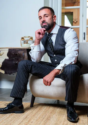 Men in suits having kinky sex