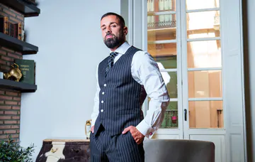 Men in suits having kinky sex