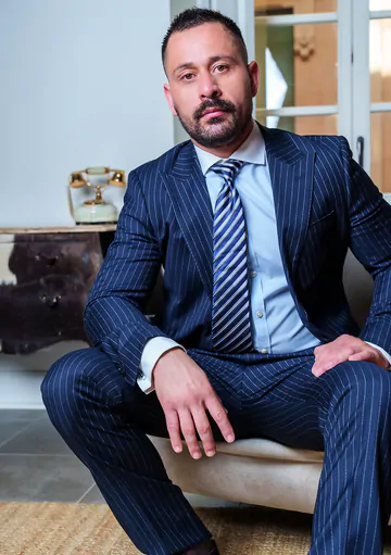 Men in suits having kinky sex