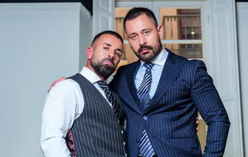 Men in suits having kinky sex