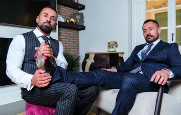 Men in suits having kinky sex