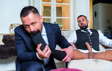 Men in suits having kinky sex