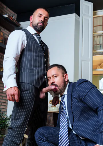 Men in suits having kinky sex