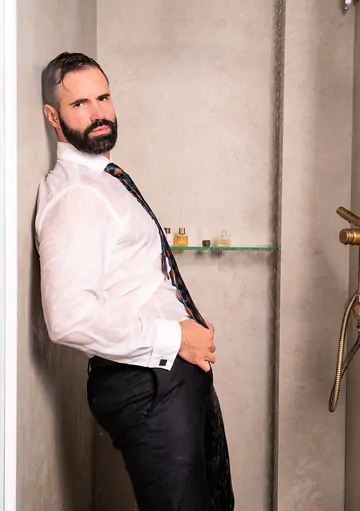 Clothed man fucking in the shower