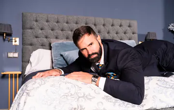 Clothed man fucking in the shower