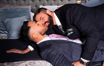 Clothed man fucking in the shower