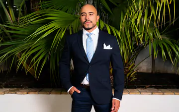 Clothed men fucking in the pool