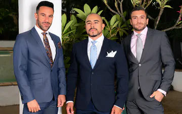 Clothed men fucking in the pool