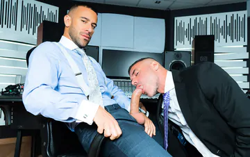 Men in suits having gay sex