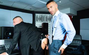 Men in suits having gay sex