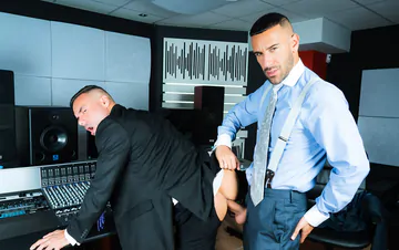 Men in suits having gay sex
