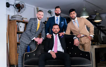 Men in suits having a foursome