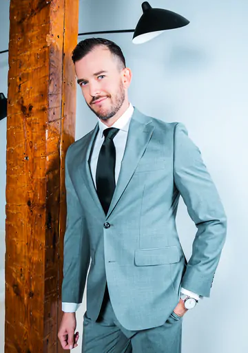 Men in suits fucking on a sofa