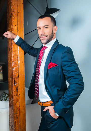 Men in suits fucking on a sofa