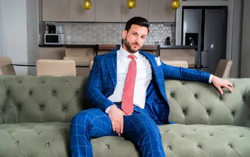 Men in suits having a threesome